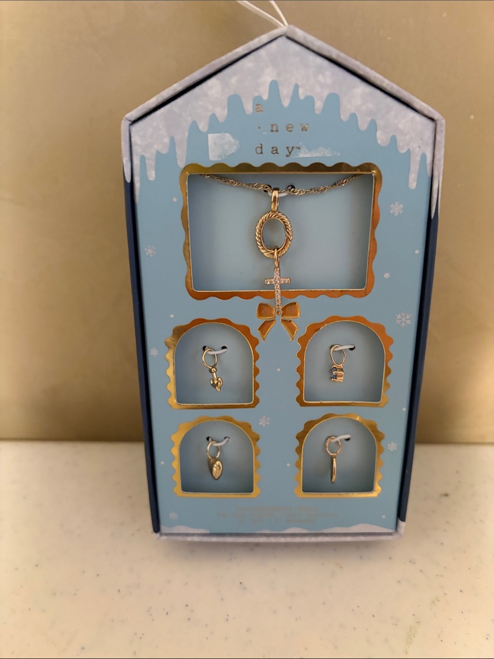 a new day Gold Pendant Necklace with Four Gold Charms